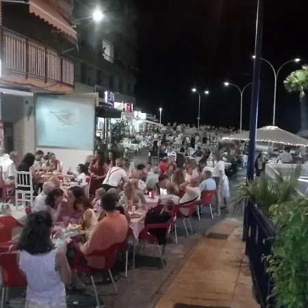 En La